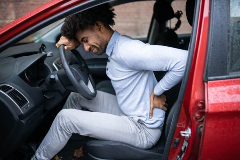 Person With A Back Injury While Sitting In A Car